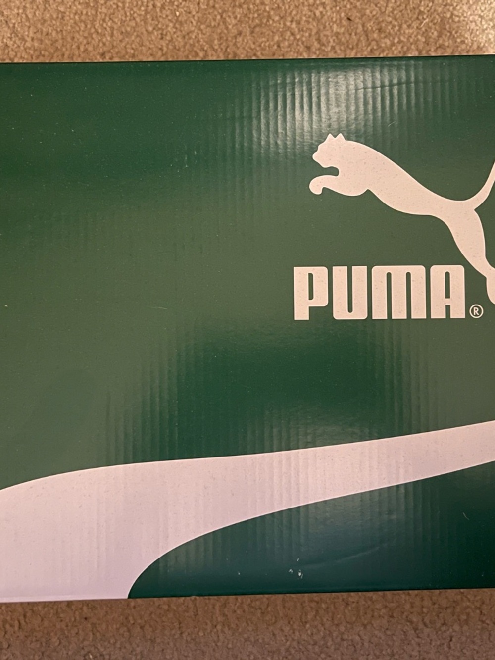 Puma White Logo on Deep Green Box